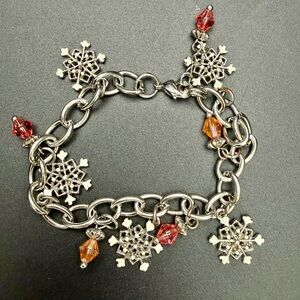 Lia Sophia Silver Wintery Themed Adjustable Bracelet with Pink and Orange Charms